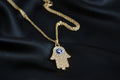 Gold Hamsa Hand Evil Eye Necklace